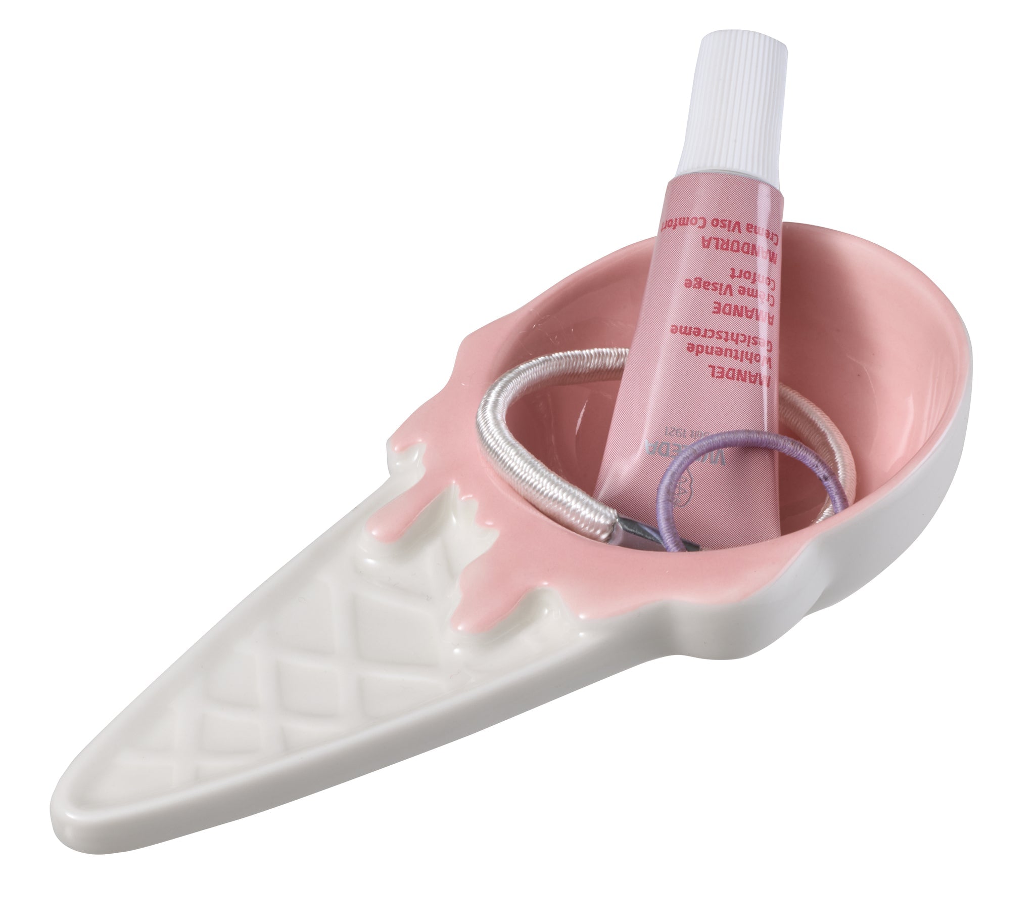 Rosa-weißes Eiscreme-Schälchen mit kleinen Haargummis und Kosmetiktube