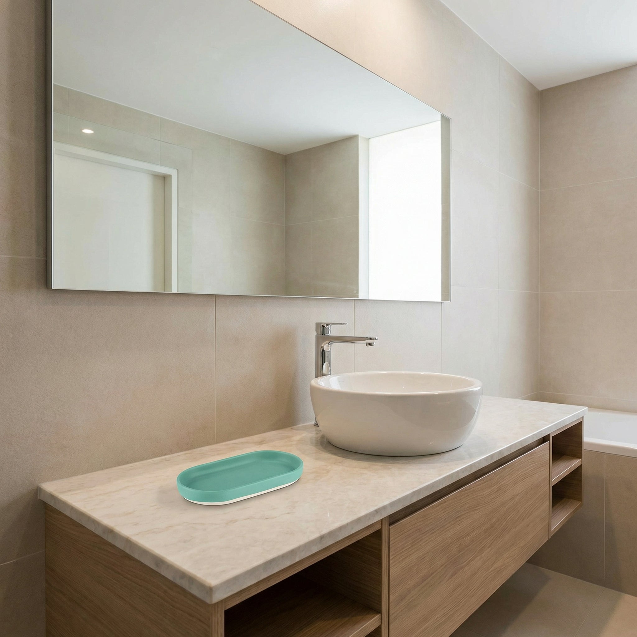 Modernes Waschbecken mit Wasserhahn und türkisfarbener Seifenschale