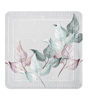 Quadratische Antirutschmatte mit zarten Blättern in Grün und Rosa.