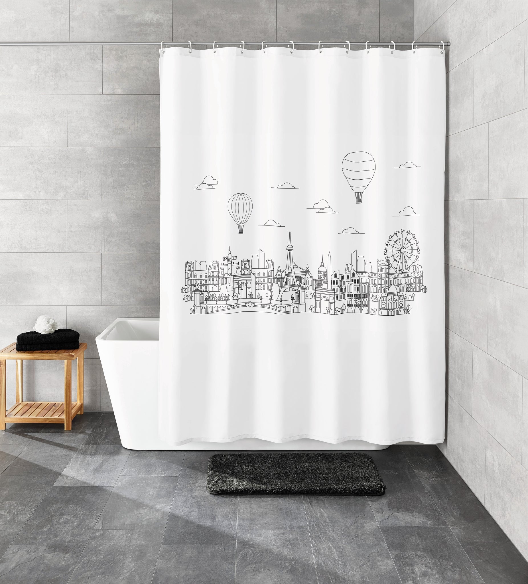 Duschvorhang PEVA WONDERLAND Schwarz-Weiß zeigt Stadtsilhouette vor Badewanne im grauen Bad.