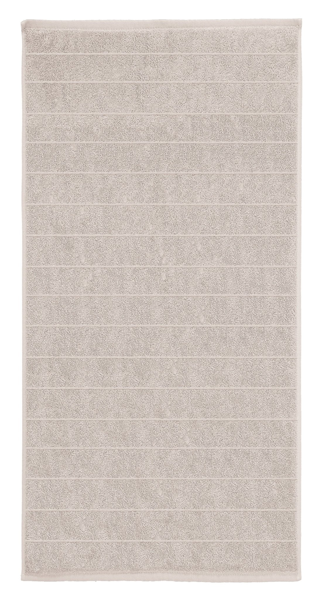 Beiger Badematte mit feinen Querstreifen auf weißem Hintergrund oben