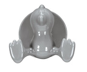 Grauer Enten-Badehaken mit rundem Saugnapf an der Badezimmerwand befestigt