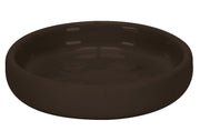Runde Seifenschale ECLIPSE in Nussbraun liegt leer auf einer neutralen Fläche.