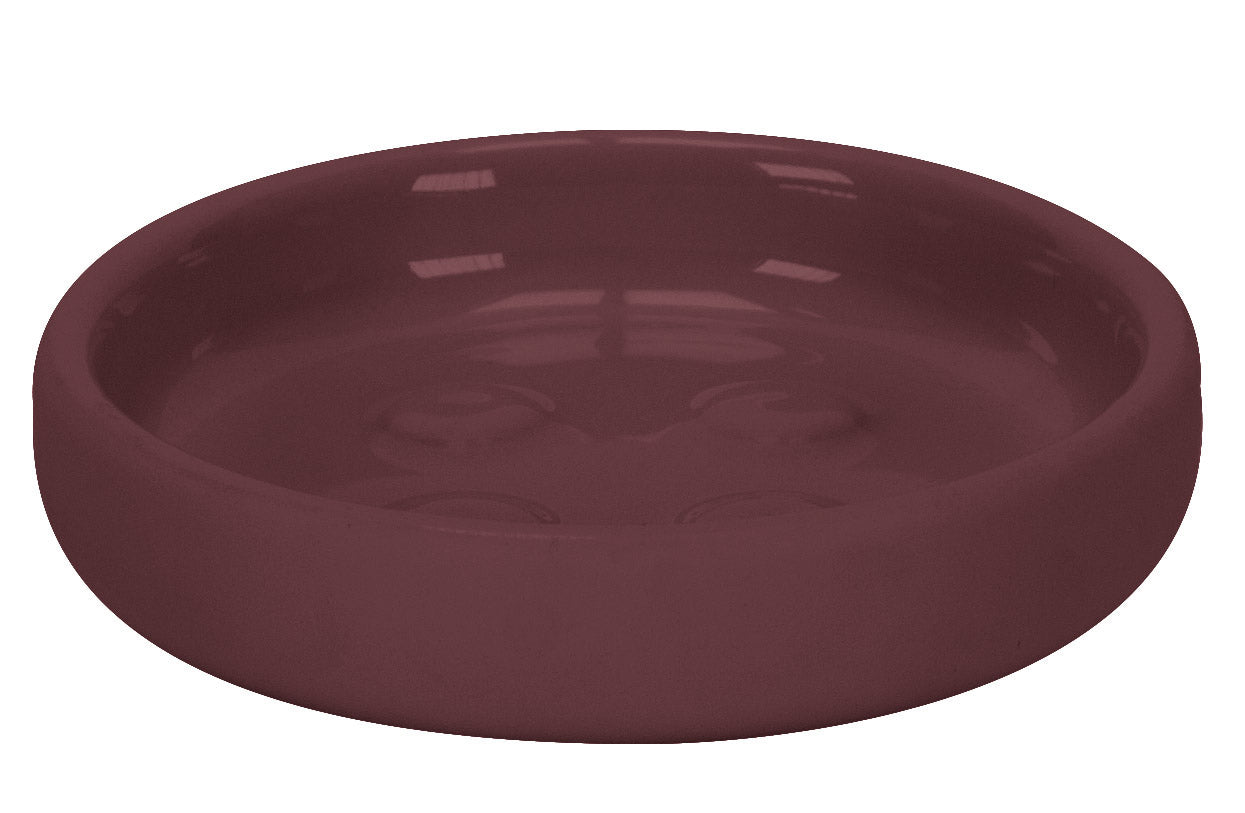 Die runde Seifenschale ECLIPSE Vino in dunklem Weinrot ist in Nahaufnahme von oben zu sehen.