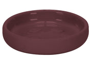 Die runde Seifenschale ECLIPSE Vino in dunklem Weinrot ist in Nahaufnahme von oben zu sehen.