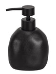 Schwarzer Seifenspender aus strukturiertem Stein mit Pumpkopf oben
