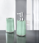 Mintgrünes Seifenspender-Set mit Zahnputzbecher auf Badablage aus Glas