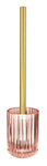 Rosa Toilettenbürste aus geriffeltem Glas mit goldfarbenem Griff.
