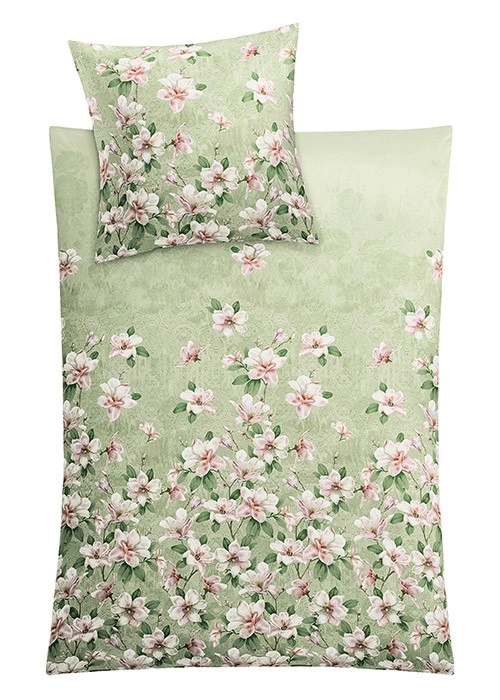 Bettwäsche-Set mit zartem Blumenmuster in Grün und Rosa, ideal für ein frisches und elegantes Schlafzimmerambiente.