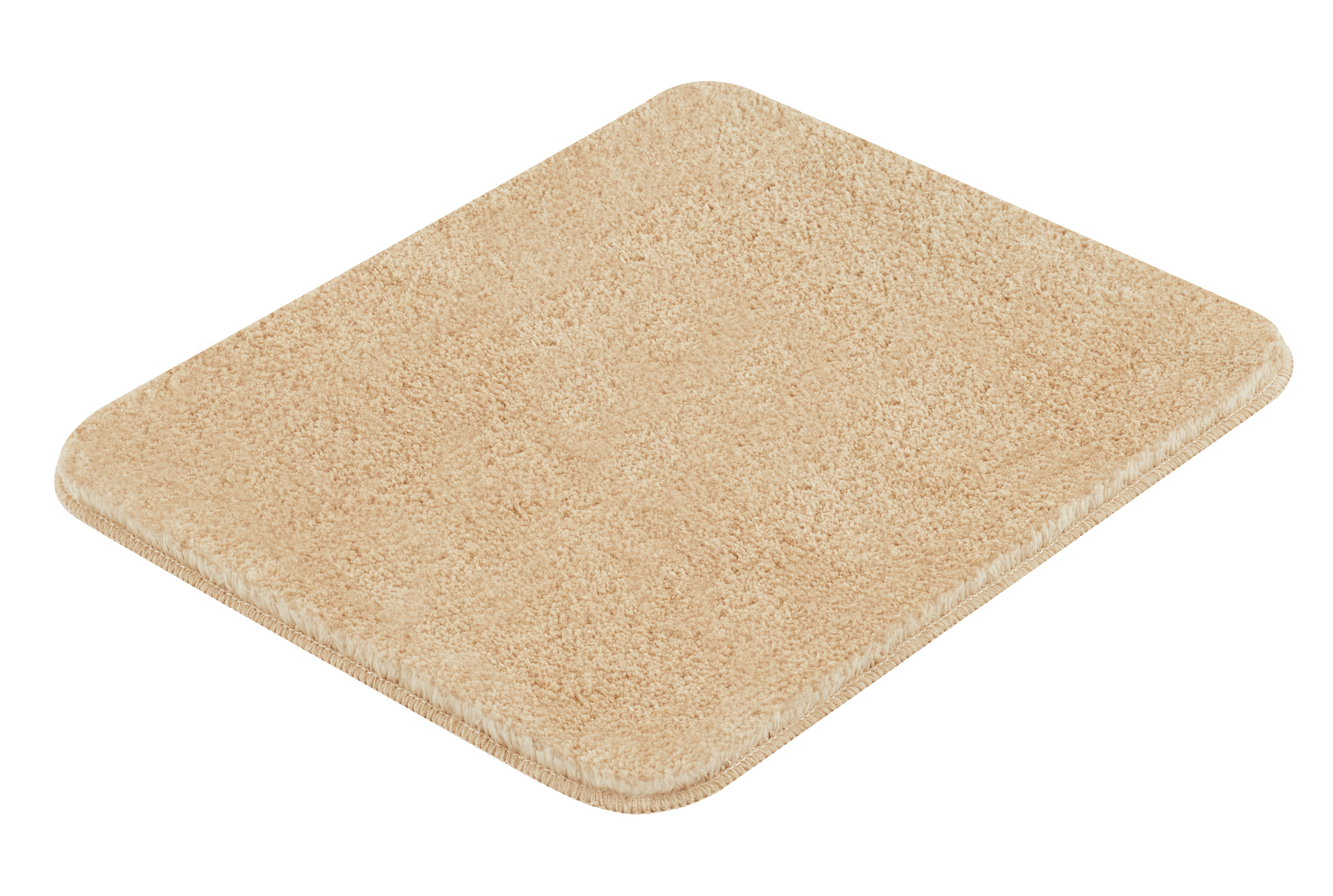 Beige Badematte mit weicher, flauschiger Oberfläche und abgerundeten Ecken, ideal für ein gemütliches Badezimmer.