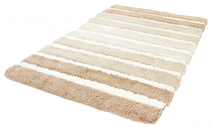 Weicher Badteppich in Beige- und Cremetönen mit Streifenmuster. Ideal für ein gemütliches Badezimmerambiente.