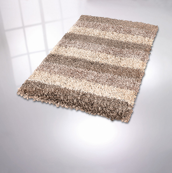 Moderner, gestreifter Hochflor-Teppich in Beige- und Brauntönen auf hellem Boden, ideal für gemütliche Wohnräume.