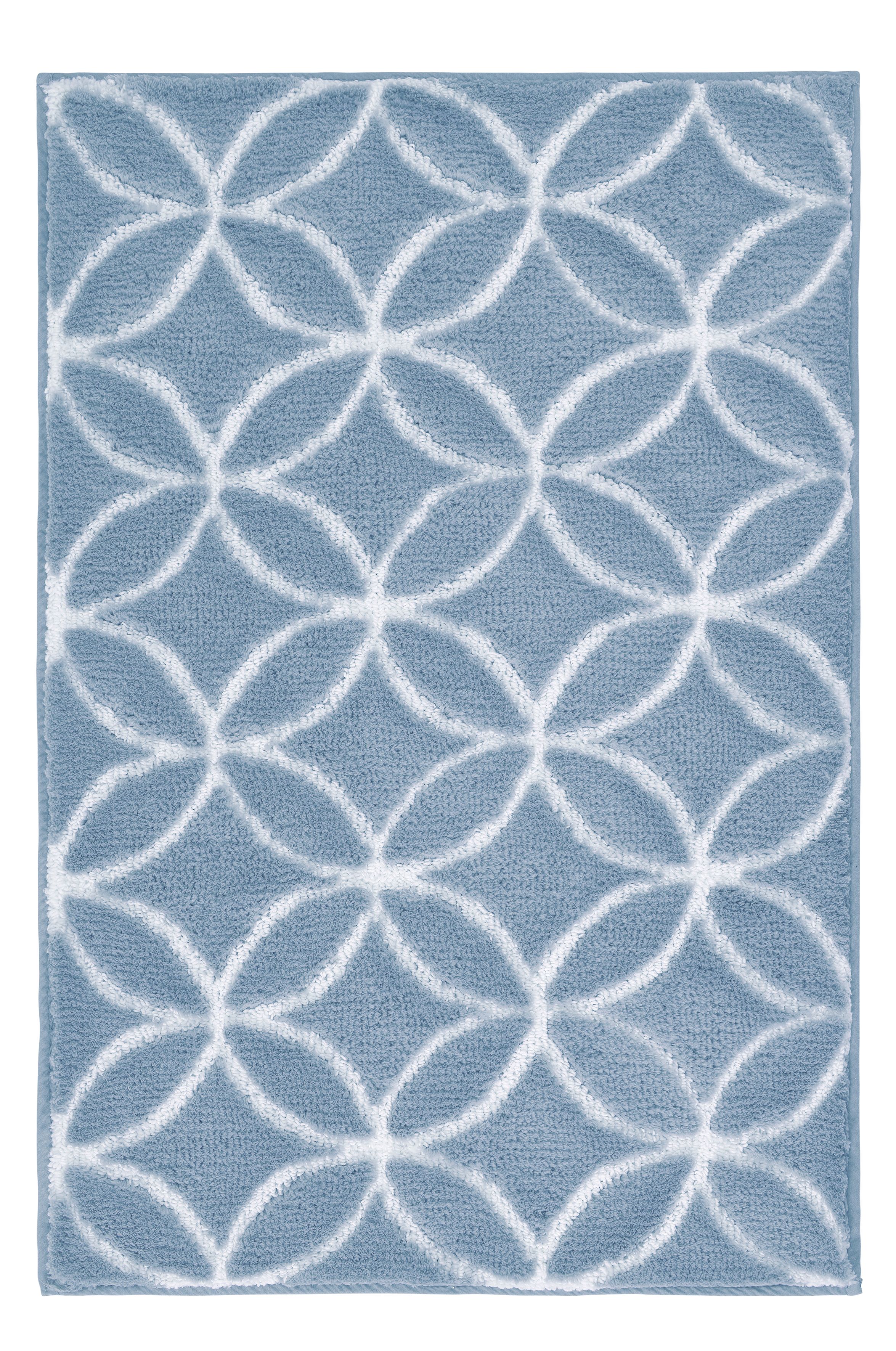 Badteppich TWIN Azur 60 x 90 cm Weicher, blauer Teppich mit weißem, geometrischem Kreismuster. Ideal für moderne Wohnräume und stilvolle Akzente.