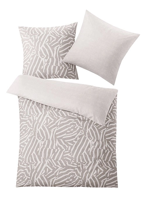 Bettwäsche-Set in Beige mit abstraktem Streifenmuster, bestehend aus Decken- und Kissenbezug.