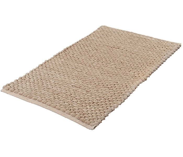 Beige Badematte mit weicher, strukturierter Oberfläche. Rechteckige Form, ideal für Badezimmer. Hochwertiges Material für Komfort und Stil.