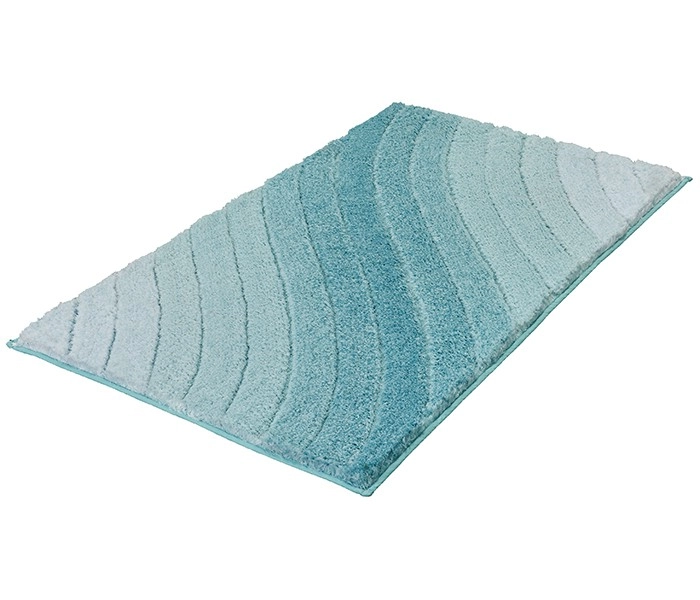 Rechteckiger, flauschiger Badteppich in verschiedenen Blautönen mit wellenförmigem Muster. Ideal für ein stilvolles Badezimmer.