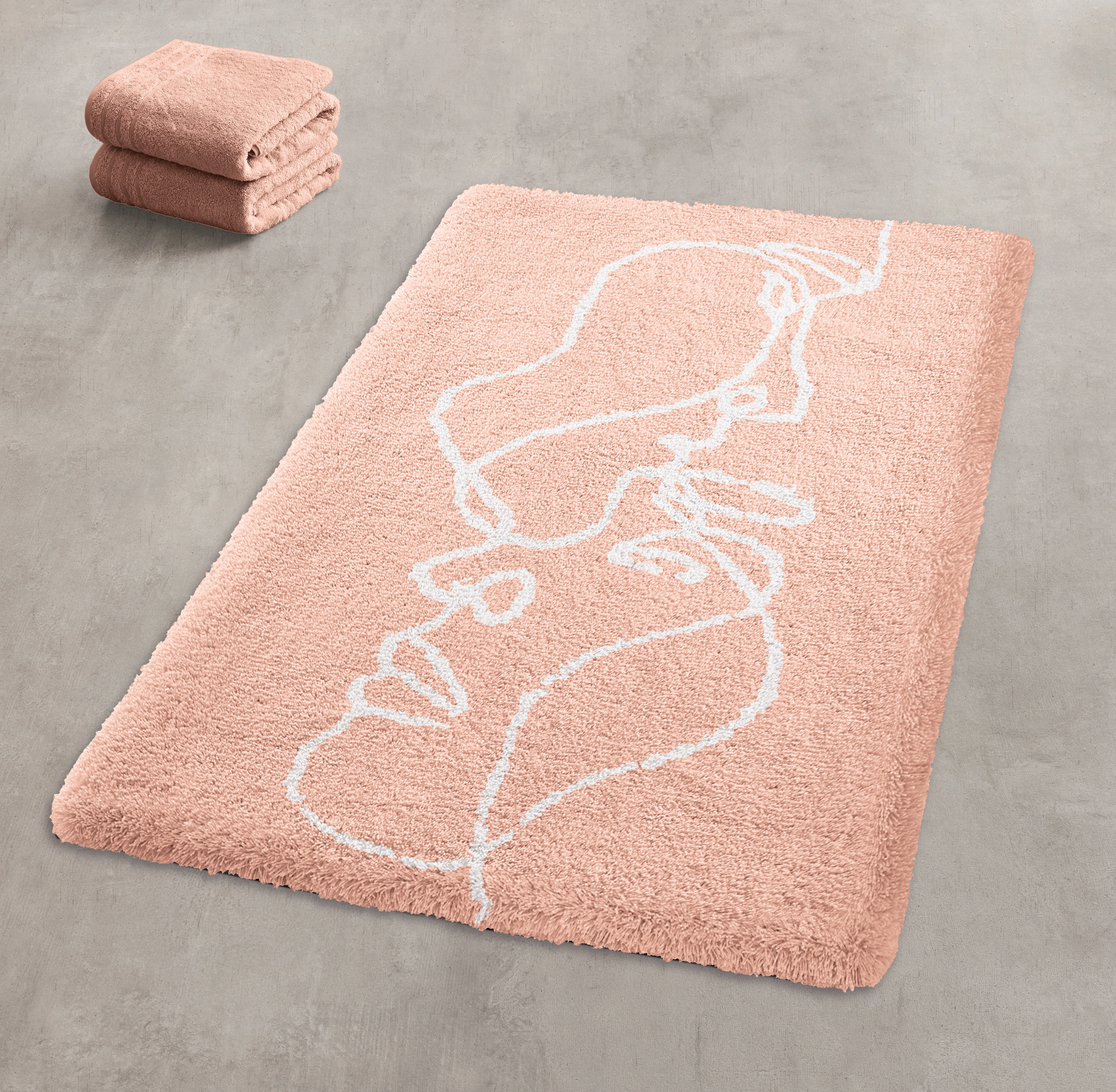 Rosa Badematte mit weißem Gesichtslinien-Design, weiche Textur, modernes und stilvolles Badezimmer-Accessoire.