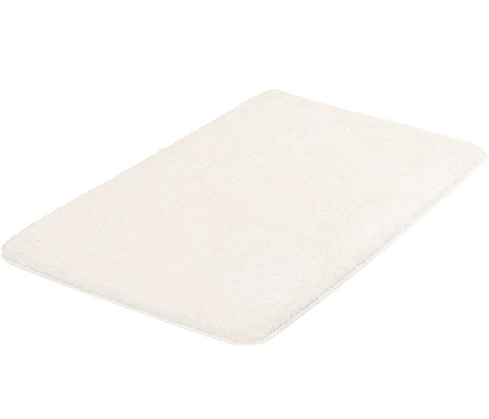 Weißer, rechteckiger Badezimmerteppich mit weicher, flauschiger Oberfläche. Ideal für ein gemütliches und stilvolles Badezimmer.