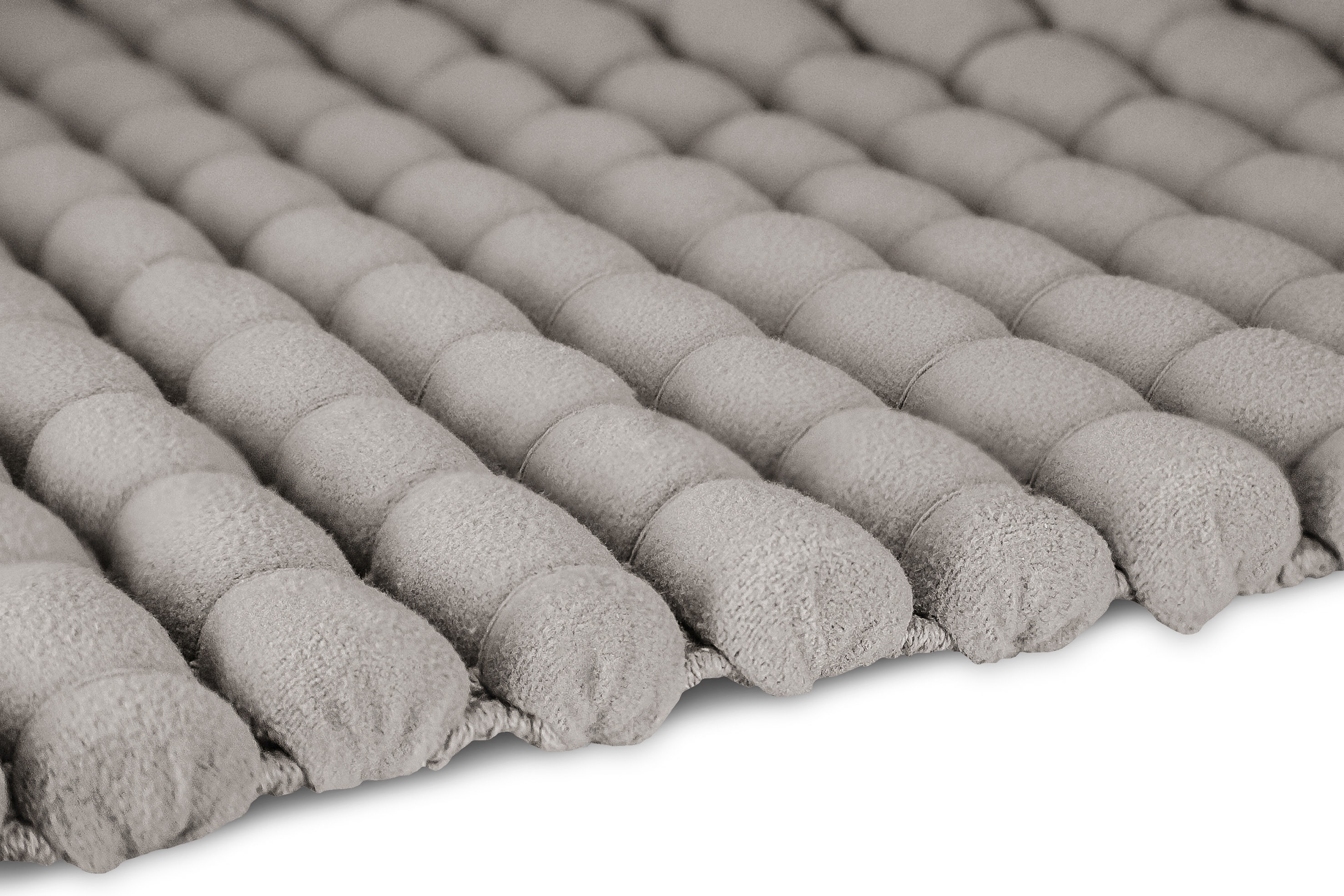Weiche, graue Badematte mit gepolstertem, rutschfestem Design für maximalen Komfort und Sicherheit im Badezimmer.